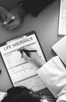 Filling out life insurance form